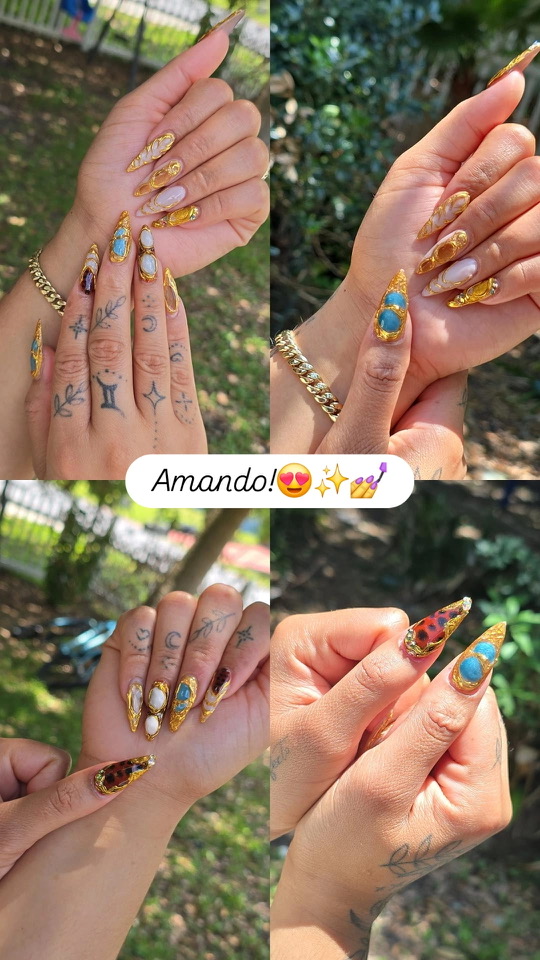 Stiletto nail art with gold chrome and gem accents